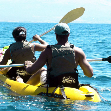 couple kayak along mauis rugged coastline product images
