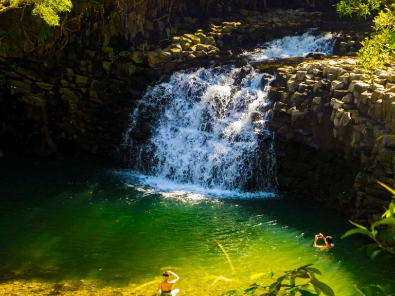 enjoying stunning waterfall views and swimming hike maui hawaii